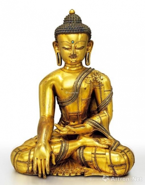 西藏十三/十四世纪的鎏金铜嵌银释迦牟尼佛坐像 成交价：5094万港币